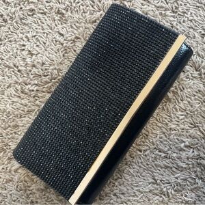 Elegant Black Clutch with Gold Accent